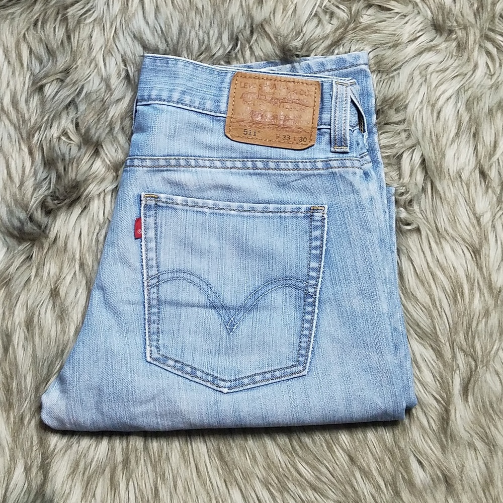 Levis 511 light wash straight leg jeans.